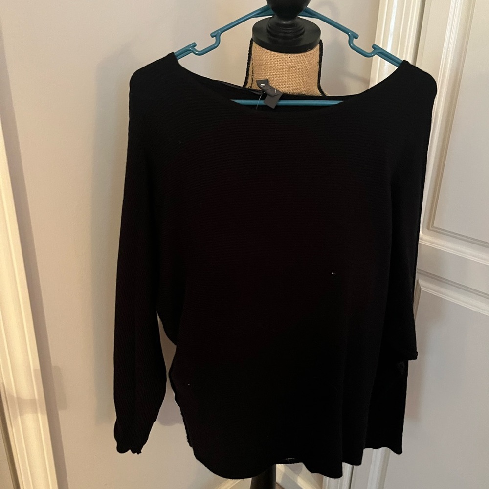 Francesca’s sweater.